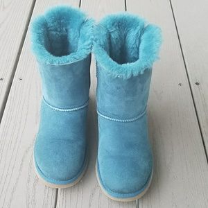 Blue UGG boots with ribbons